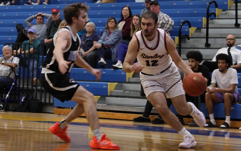 Warrior Men’s Basketball win home opener against Barclay