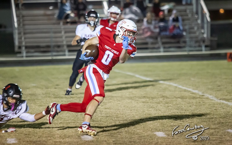 Griffith Leads Stout Trinity Catholic Defense in Playoff Opener