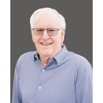 Delbert “Del” E. Hueske